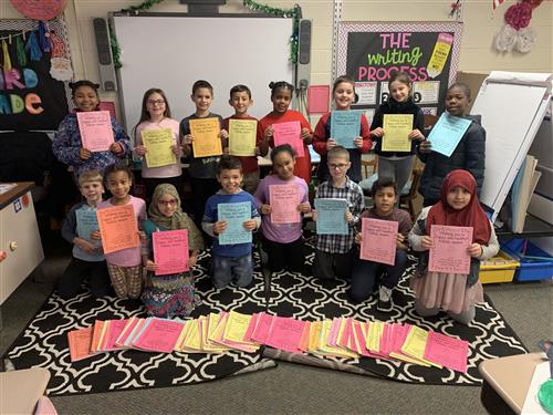 Armstrong students put together activity books 
