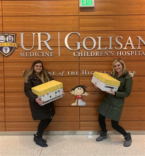 teachers deliver activity books to hospital 