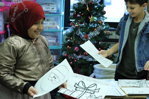 Armstrong students put together activity books 