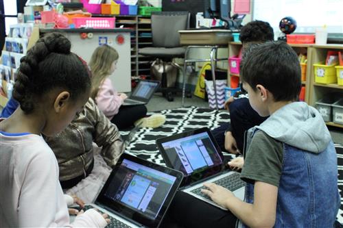 Armstrong students put together activity books 