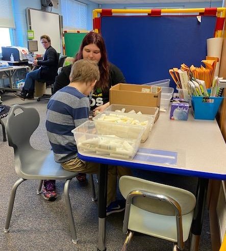 Walt Disney students put together toiletry bags 