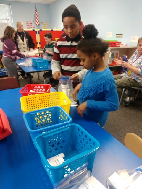 Walt Disney students put together toiletry bags 