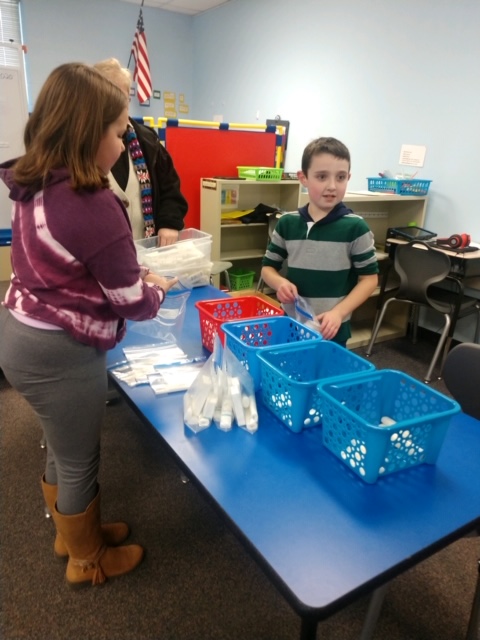 Walt Disney students put together toiletry bags 